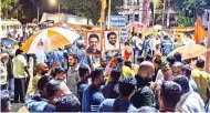  ?? ?? Shiv Sena workers gather outside ‘Matoshree’