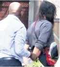  ?? Orrin Singh ?? Del Vecchio being escorted into the Verulam Magistrate’s Court by a member of the Hawks last Thursday