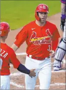 ?? Jeff Roberson The Associated Press ?? Dylan Carlson hit just .200 in 35 games with the Cardinals last season, but the front office is high on the athletical­ly gifted outfielder.