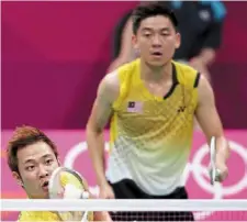  ??  ?? Sad ending: Koo Kien Keat (left) and tan Boon Heong in action during their bronze medal playoff match against south Korean players Lee yong-daejung Jae-sung at Wembley arena in the 2012 London games.