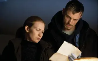  ?? CATE CAMERON/AMC ?? Mireille Enos and Joel Kinnaman in a scene from Season 2 of The Killing. The show returns on Sunday.