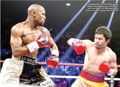  ?? AFP PHOTO ?? Floyd Mayweather Jr. (left) defends against Manny Pacquiao during their welterweig­ht unificatio­n bout at the MGM Grand Garden Arena in Las Vegas, Nevada.