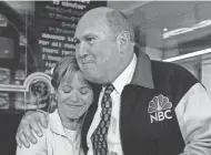  ??  ?? Willard Scott hugs “Today” show colleague Katie Couric after a ceremony inducting Scott into NBC’s “Walk of Fame” in March 2000.