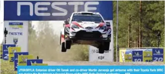  ??  ?? JYVASKYLA: Estonian driver Ott Tanak and co-driver Martin Jarveoja get airborne with their Toyota Yaris WRC car during the Ruuhimaki 1 Special Stage of the WRC Rally Finland yesterday. — AFP