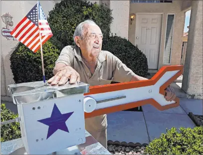  ?? Erik Verduzco Las Vegas Review-journal @Erik_verduzco ?? Onofrio “No-no” Zicari, 97, who hit Omaha Beach as an Army private on D-day, keeps busy on wood-working projects in his garage.