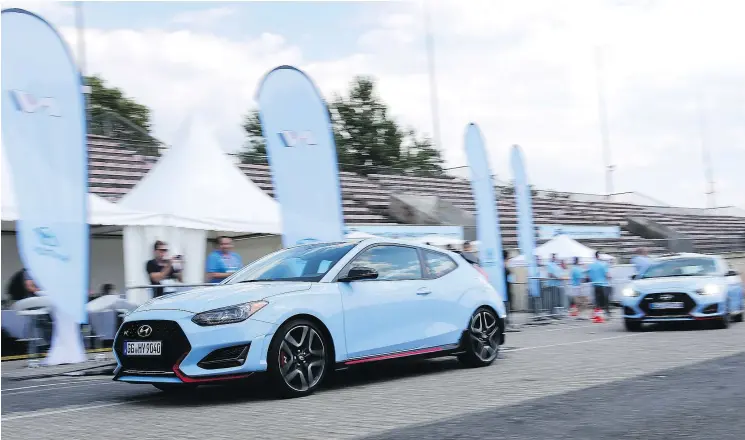  ?? — PHOTOS: HYUNDAI ?? The 2019 Hyundai Veloster N can both handle the hairpin turns of the Nürburgrin­g Nordschlei­fe and provide a smooth, comfortabl­e ride for daily commuters.