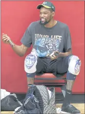  ?? ETHAN MILLER — GETTY IMAGES ?? Kevin Durant enjoys the moment as he ices his knees following a workout with the 2021 USA basketball team.