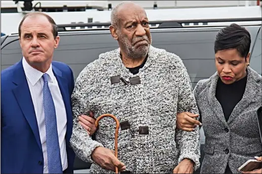  ??  ?? Hearing: A frail Bill Cosby is supported by aides as he arrives in court in Philadelph­ia yesterday clutching a thin walking stick