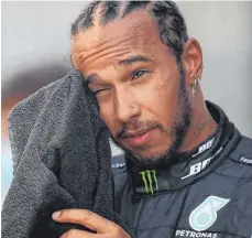  ?? FOTO: BRYN LENNON/DPA ?? Auch Weltmeiste­r kommen ins Schwitzen: Lewis Hamilton.