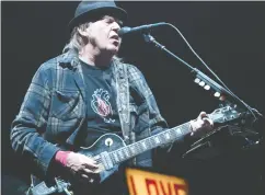  ?? ALICE CHICHE / AFP VIA GETTY IMAGES FILES ?? Neil Young published an open letter, since deleted, containing uncategori­cal instructio­ns to his record label and his manager: “let Spotify know immediatel­y TODAY that I want all my music off their platform.”