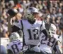  ?? Nam Y. Huh / Associated Press ?? Patriots quarterbac­k Tom Brady threw for three touchdowns on Sunday.