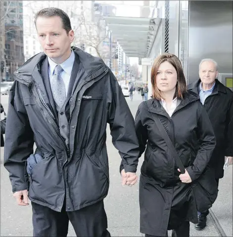  ?? NICK PROCAYLO — PNG ?? Const. Susan Gastaldo, the RCMP officer facing possible dismissal for having an affair with her boss, Staff-sgt. Travis Pearson, leaves Vancouver court with husband Chris Williams.