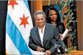  ?? BRIAN CASSELLA/CHICAGO TRIBUNE ?? Mayor Lori Lightfoot, left, with CPS CEO Janice Jackson, talks about the Chicago Teachers Union strike Oct. 29, 2019, at City Hall.