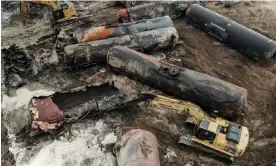  ?? Photograph: Tannen Maury/EPA ?? An aerial image of destroyed rail cars as cleanup continues in East Palestine, Ohio.