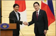  ?? (AP/Kimimasa Mayama) ?? Philippine President Ferdinand Marcos Jr. (left) and Japanese Prime Minister Fumio Kishida conclude their joint press remarks after their talks at prime minister’s official residence Thursday in Tokyo.