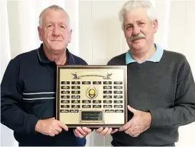  ??  ?? Rex Turner and Robert Gough won the 4BBB champions at Garfield Golf Club.