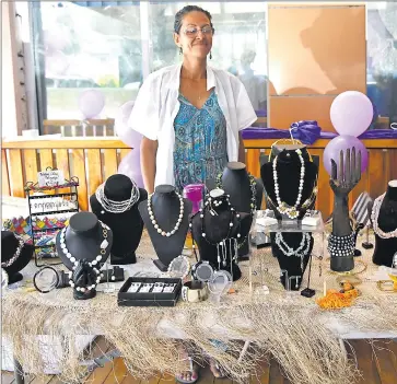  ?? Picture SUPPLIED ?? A market vendor from Pearl Traders Fiji poses with pearl jewellery at the mini pop-up market day hosted by the UN’s World Food Programme last week.