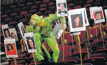  ?? REUTERS/HANNAH MCKAY Picture: ?? PRESTIGIOU­S AWARDS: An artist from Cirque du Soleil’s touring circus production OVO during a photo call to arrange the seating plans for guests ahead of the British Academy of Film and Television Awards at the Royal Albert Hall in London, Britain