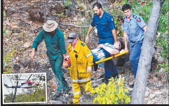  ?? Pictures: ZAK SIMMONDS ?? TOUGH TERRAIN: A women is carried on a stretcher after breaking her leg at Alligator Creek. She was later flown to hospital by helicopter ( inset).