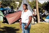  ??  ?? Sheldon Stately Sr., who grew up in the neighborho­od, now lives at the homeless encampment in Powderhorn Park.