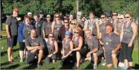  ?? SUBMITTED PHOTO — POTTSTOWN ATHLETIC CLUB ?? The RoFoMoFo’s, the dragon boat team of MFitness gym in Royersford, pose with their gold medals at the Independen­ce Dragon Boat Regatta in Philadelph­ia on June 3.