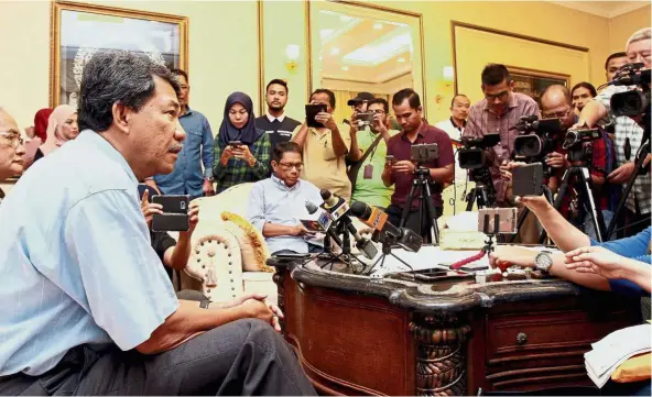  ??  ?? Fight another day: Mohamad Hasan speaking to reporters during his final press conference at the mentri besar’s official residence in Seremban.