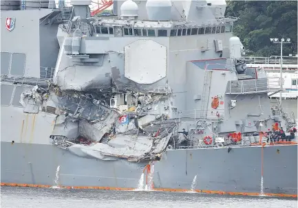  ??  ?? THE ARLEIGH Burke-class guided-missile destroyer USS Fitzgerald, damaged by colliding with a Philippine-flagged merchant vessel, is seen at the US naval base in Yokosuka, Japan on June 18.
