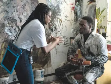  ?? ?? Above: Nia Dacosta and Yahya Abdul-mateen II on the set of Candyman. Below: Writer/director Darnell Martin (left) and filmmaker Julie Dash.