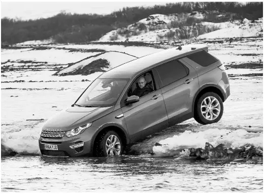  ?? Nick Dimbleby for Driving ?? David Booth tests the traction abilities of the new 2015 Land Rover Discovery Sport during a recent test drive in Iceland.