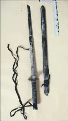  ??  ?? A Samurai sword allegedly owned by the accused