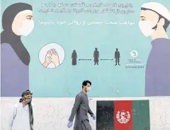  ??  ?? A mural in Kabul advises Afghans on how to protect themselves from the coronaviru­s.