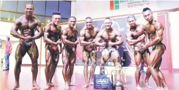  ??  ?? Maskabi (third right) pose with other category champions (from right) Anthony, Mohd Sani, Jacob, Wilfred, Huang and Donny.