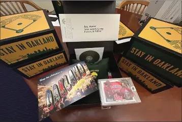  ?? STEPHEN LUCERO VIA AP ?? A box to be sent to Los Angeles Angels owner Arte Moreno in an effort to sway next week's vote at the Major League Baseball owners meetings to keep the A's in Oakland, is displayed on Tuesday.