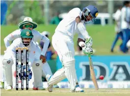  ?? — AFP ?? Upul Tharanga plays a shot en route to his century against Bangladesh.