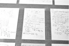 ??  ?? Some of Einstein’s manuscript pages, currently on display in the Givat Ram Hebrew University of Jerusalem. — AFP photo