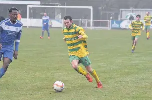  ?? James Eastup ?? Mark Houghton, who opened the scoring for Linnets on Saturday, takes on the Hanley Town defence.