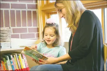  ?? (Courtesy photo/CASA) ?? Randi Fritsche has been volunteeri­ng her time to Court Appointed Special Advocates of Northwest Arkansas since 2016. Her mission, like that of all CASA volunteers, is to be the voice of children in the foster care system. (The children in these photos are models, not children being served by CASA.)