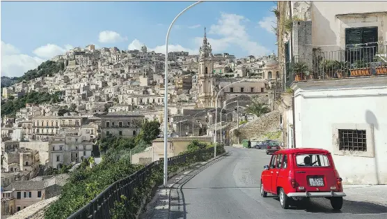  ?? DOMINIC ARIZONA BONUCCELLI ?? Brace yourself for driving in Italian cities such as Modica in Sicily: Drivers may be more aggressive than you’re used to.