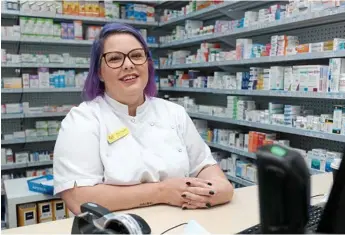  ??  ?? Pharmacist Rachael Harley manages the Cambooya Community Discount Pharmacy inside the Cambooya Post Office.