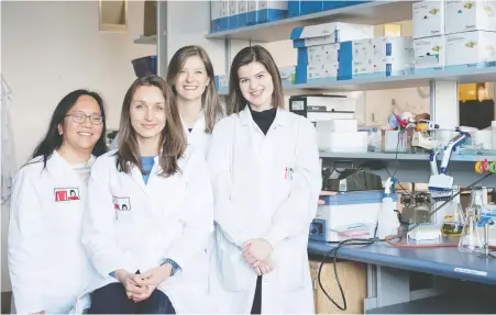  ?? UNIVERSITY OF BRITISH COLUMBIA ?? “Having people who come from different background­s makes the science much more complete,” says Dr. Carolina Tropini, second from left, shown here with her labmates at the University of British Columbia.