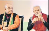  ?? RAJ K RAJ/HT PHOTO ?? BJP president Amit Shah with PM Narendra Modi on the first day of the party’s national convention in Delhi.