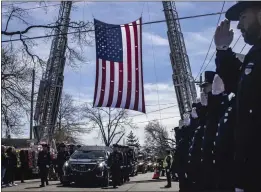  ?? DAVE SANDERS — THE NEW YORK TIMES ?? The funeral of Jonathan Diller, a NYPD officer slain in the line of duty, at Saint Rose of Lima Catholic Church in Massapequa, N.Y., on Saturday.