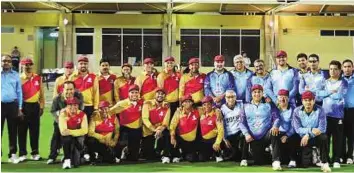  ?? Courtesy: DCC ?? Winning script Armchair Boys and Dubai Cricket Council players pose before a friendly match at The Sevens cricket ground. Armchair Boys won the match by 38 runs.