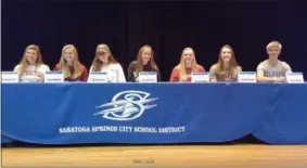  ?? STAN HUDY SHUDY@DIGITALFIR­STMEDIA.COM @STANHUDY ON TWITTER ?? Seven Saratoga Springs seniors and Saratoga Rowing Associatio­n rowers celebrate their college commitment­s Wednesday in the Teacher’s Auditorium.