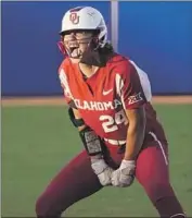  ?? Sue Ogrocki Associated Press ?? OKLAHOMA’S Jayda Coleman is fired up after hitting a double against Texas in the first inning.