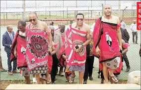  ?? ?? The delegation walking out of the EOCGA Multi-Purposes Courts led by the PM (front L), the Minister Bulunga (C) and EOCGA’s Maxwell Jele (R) after the touring of the facility.