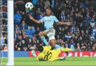  ?? DAVE THOMPSON / AP ?? Raheem Sterling scores past Feyenoord goalkeeper Brad Jones to earn Manchester City a 1-0 Champions League victory at Etihad Stadium in Manchester on Tuesday.