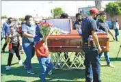  ?? Am ?? MOURNERS at the funeral of Israel Vazquez Rangel, a reporter who was killed in Salamanca, Mexico.