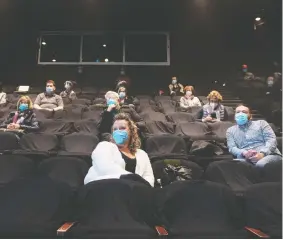 ?? GRAHAM HUGHES / THE CANADIAN PRESS ?? A socially distanced audience awaits a performanc­e in Montreal. According to public data, 19 million Canadians now have two doses of COVID-19 vaccine.