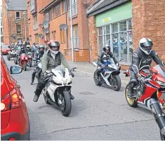  ?? Dougie Nicolson. Pictures: ?? Mourners turned out in bright colours to celebrate the life of tragic Steven, and a tribute was made by around 20 motorcycli­sts who revved their engines in salute of the motoring enthusiast.